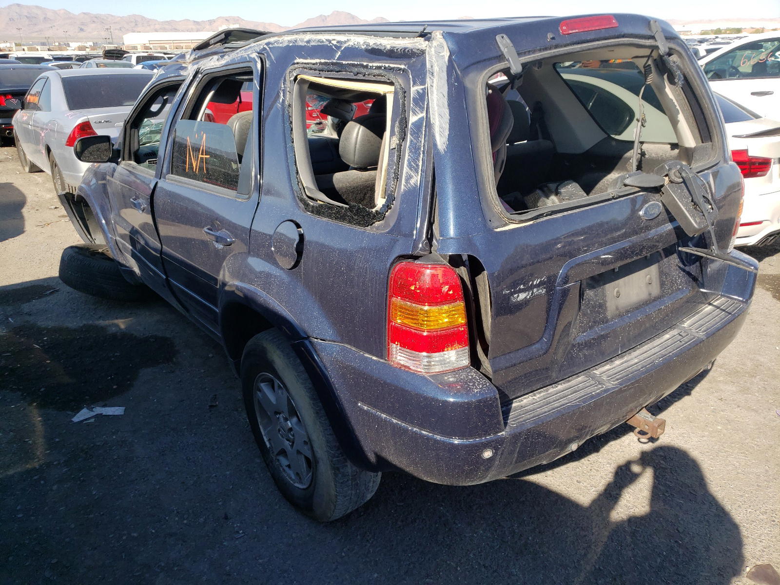 Photo 3 from auction – 2003 FORD ESCAPE LIM with VIN 1FMCU04183KD37928