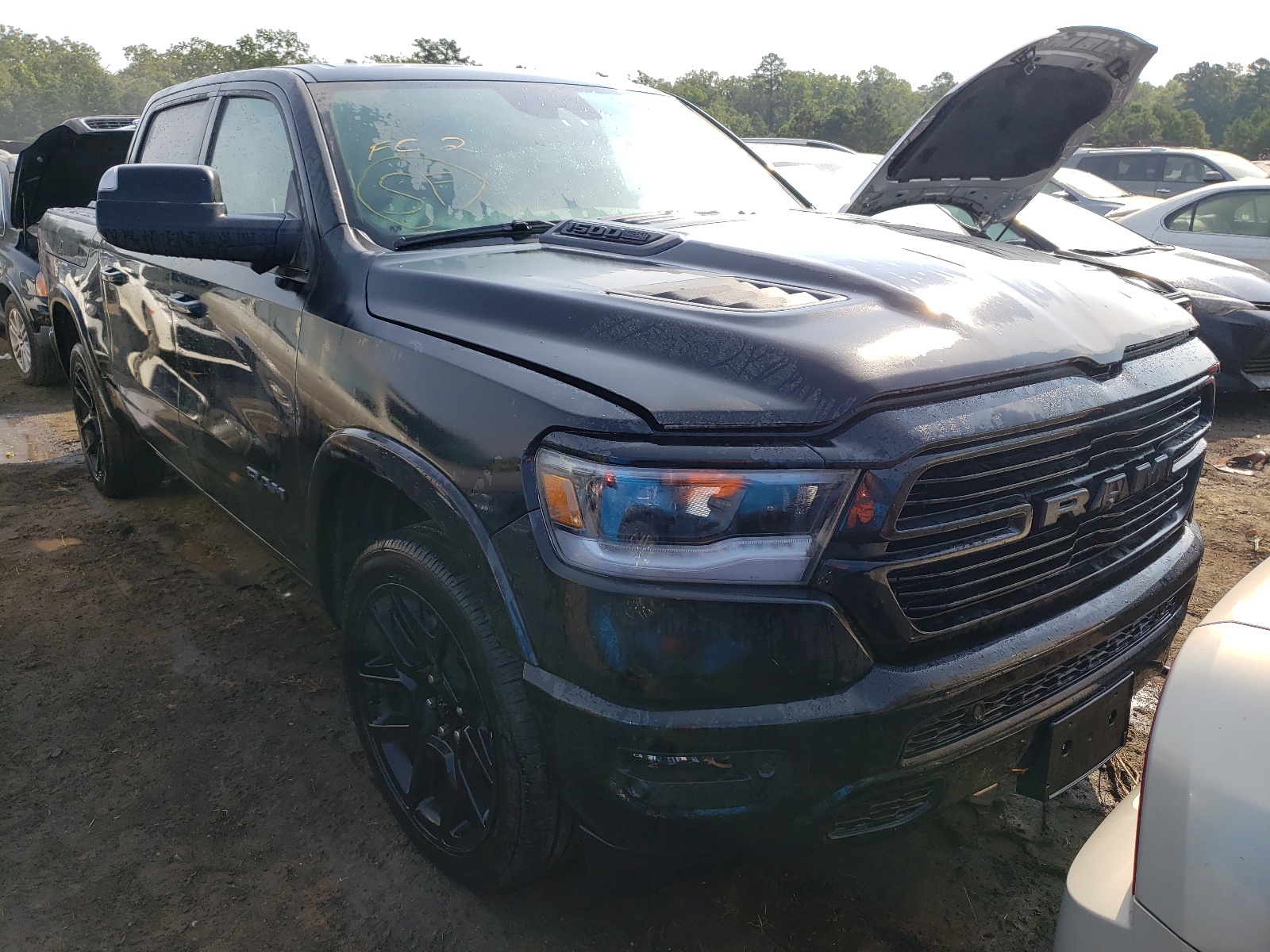 RAM 1500 LARAM 2021 with VIN 1C6SRFJT6MN568473 - Photo from auction