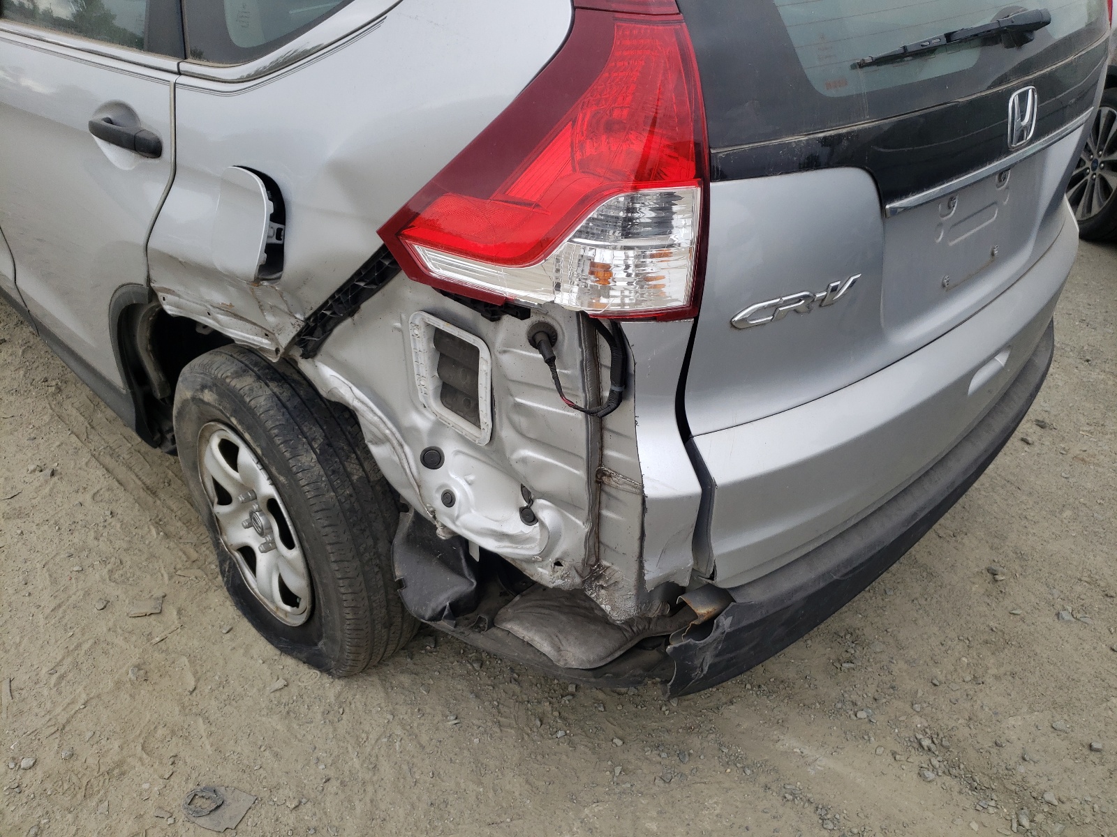 Photo 9 from auction – 2014 HONDA CR-V LX with VIN 2HKRM3H39EH521532