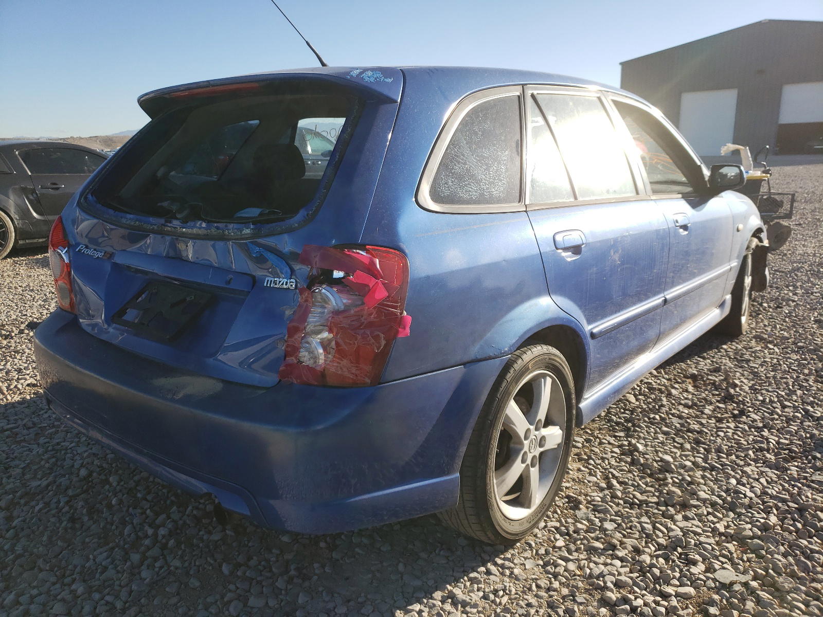 Photo 4 from auction – 2003 MAZDA PROTEGE with VIN JM1BJ245931185090