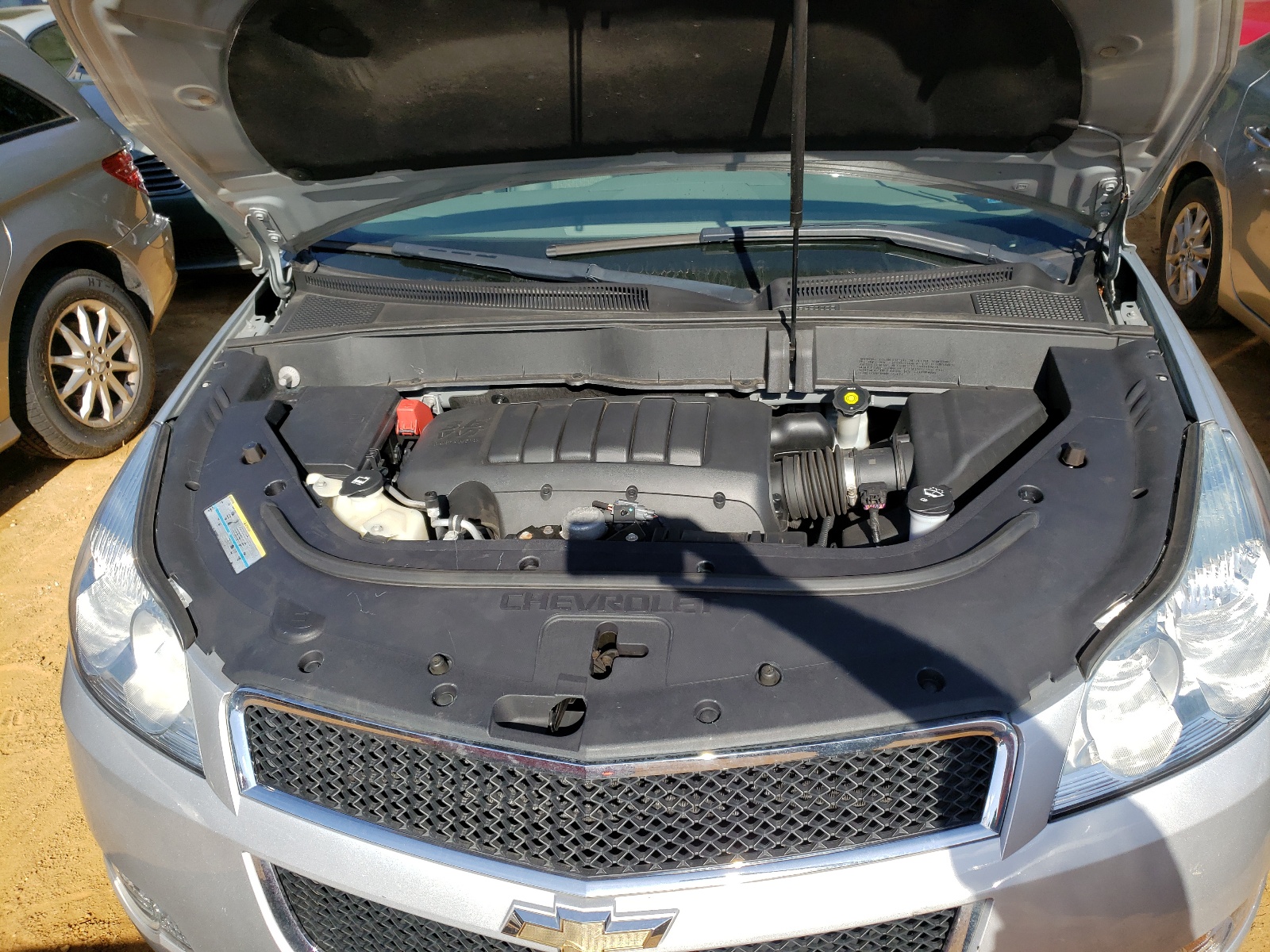Photo 7 from auction – 2009 CHEVROLET TRAVERSE L with VIN 1GNEV23D19S158602
