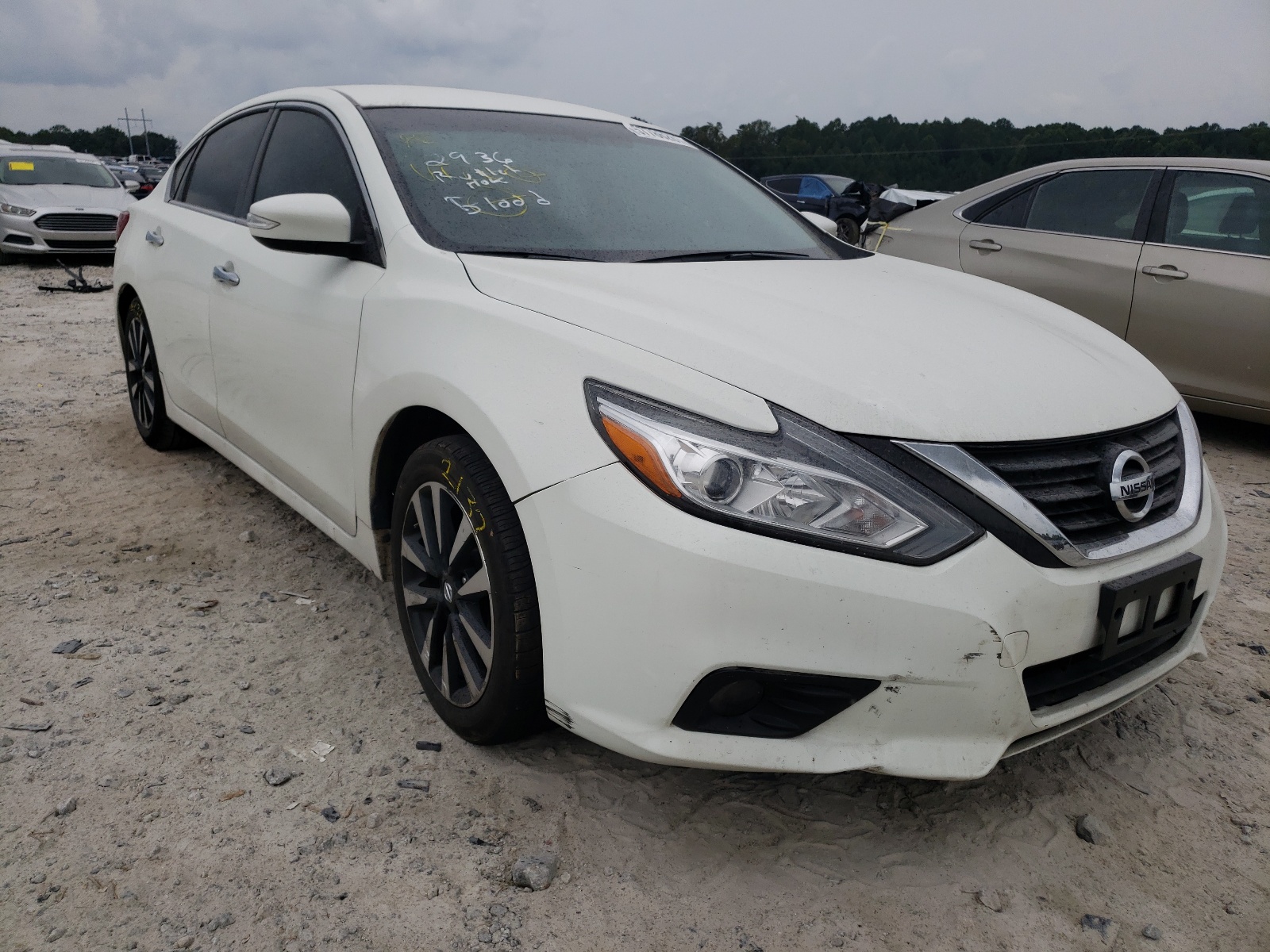 NISSAN ALTIMA 2.5 2018 with VIN 1N4AL3AP9JC172820 - Photo from auction