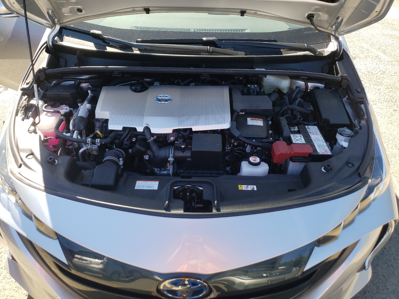 Photo 7 from auction – 2021 TOYOTA PRIUS PRIM with VIN JTDKAMFP5M3195082