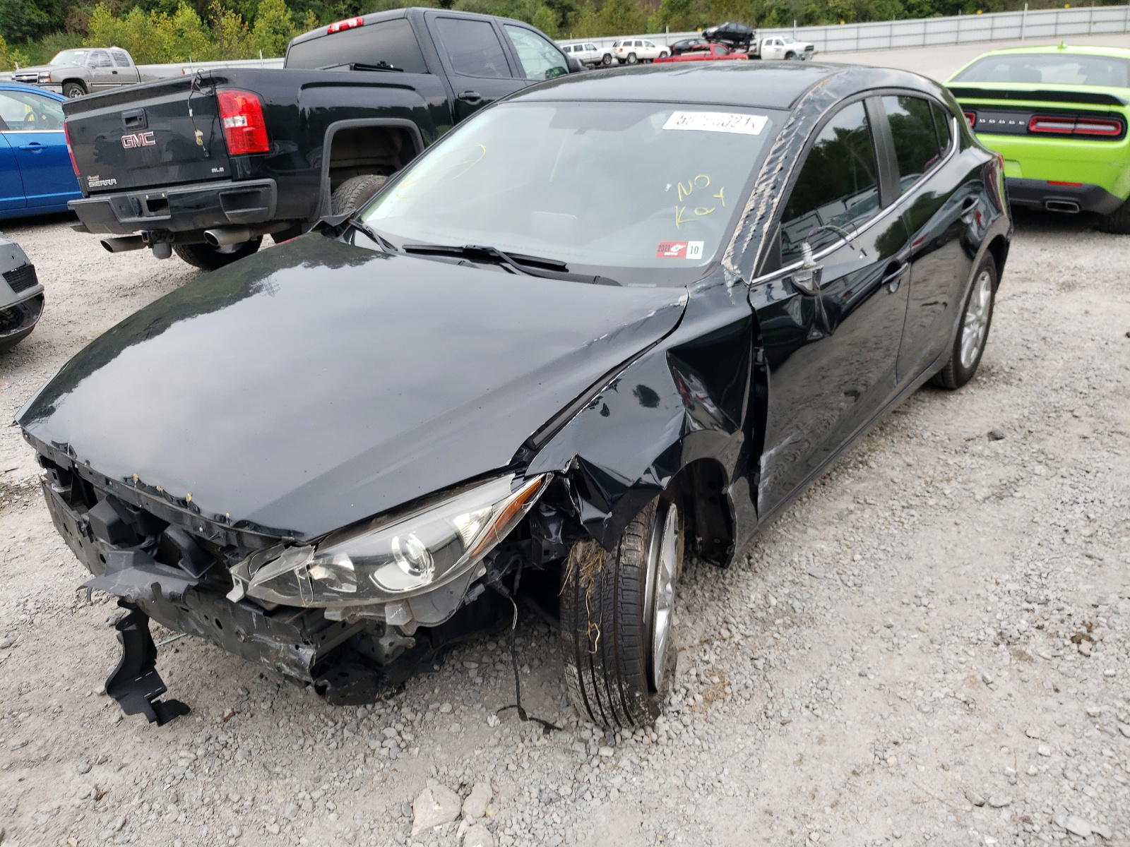 Photo 2 from auction – 2014 MAZDA 3 TOURING with VIN JM1BM1L72E1102476