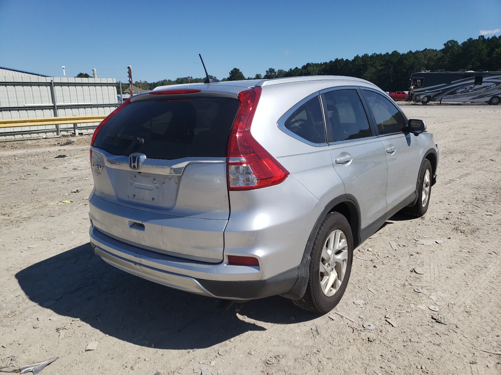 Photo 4 from auction – 2016 HONDA CR-V EXL with VIN 2HKRM3H77GH500216
