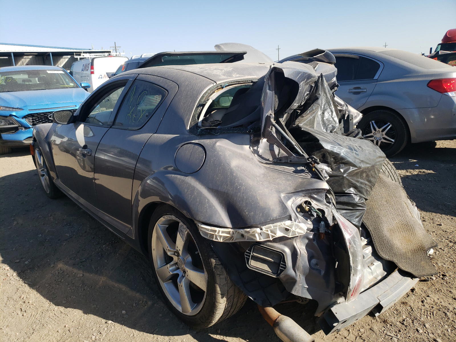 Photo 3 from auction – 2006 MAZDA RX8 with VIN JM1FE173860205706