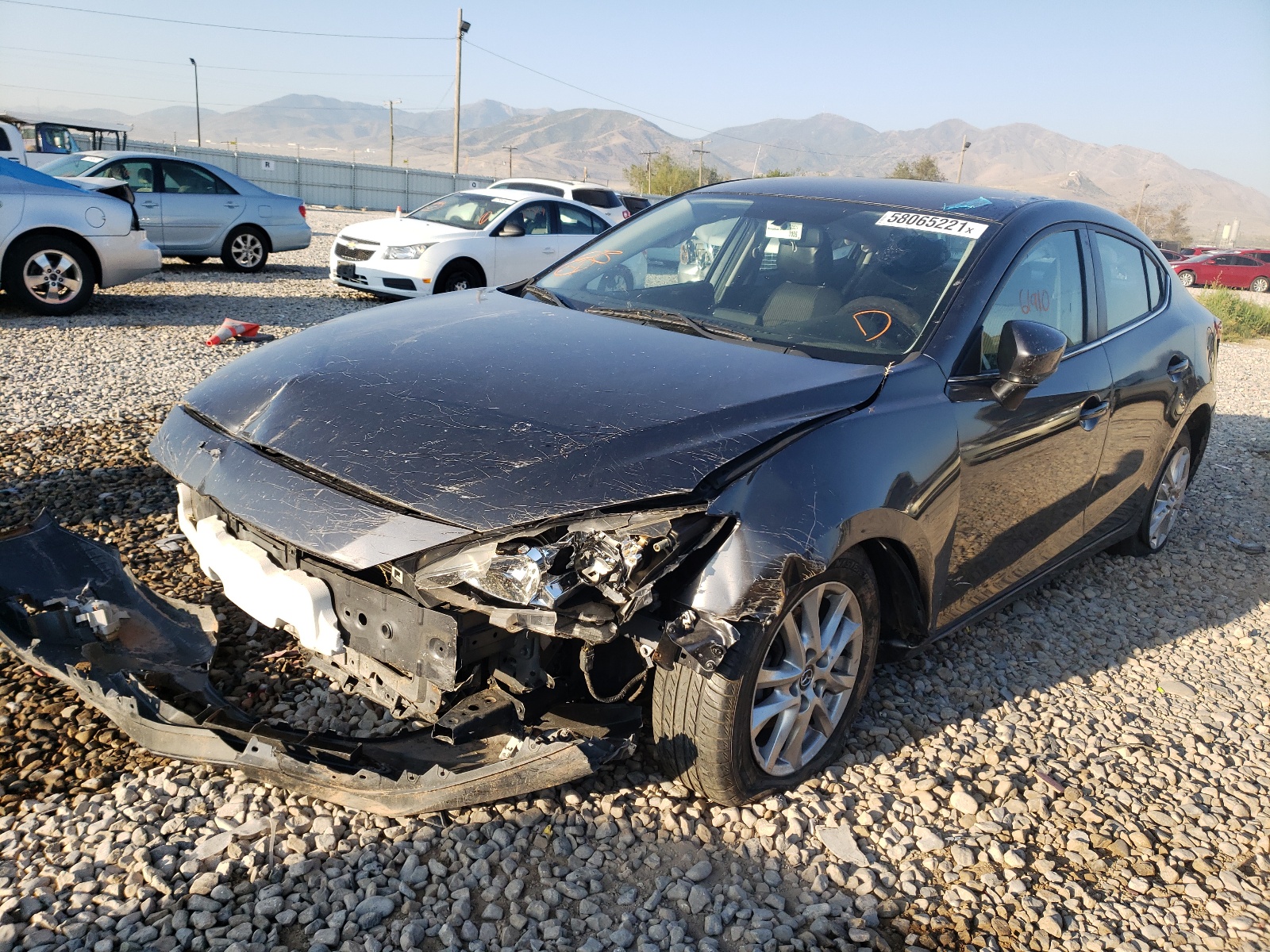 Photo 2 from auction – 2014 MAZDA 3 TOURING with VIN JM1BM1V73E1144023
