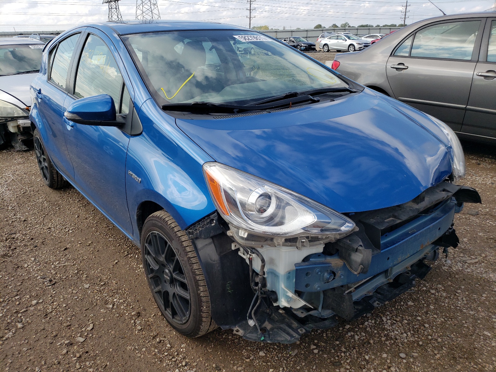 Photo 1 from auction – 2015 TOYOTA PRIUS C with VIN JTDKDTB30F1109681