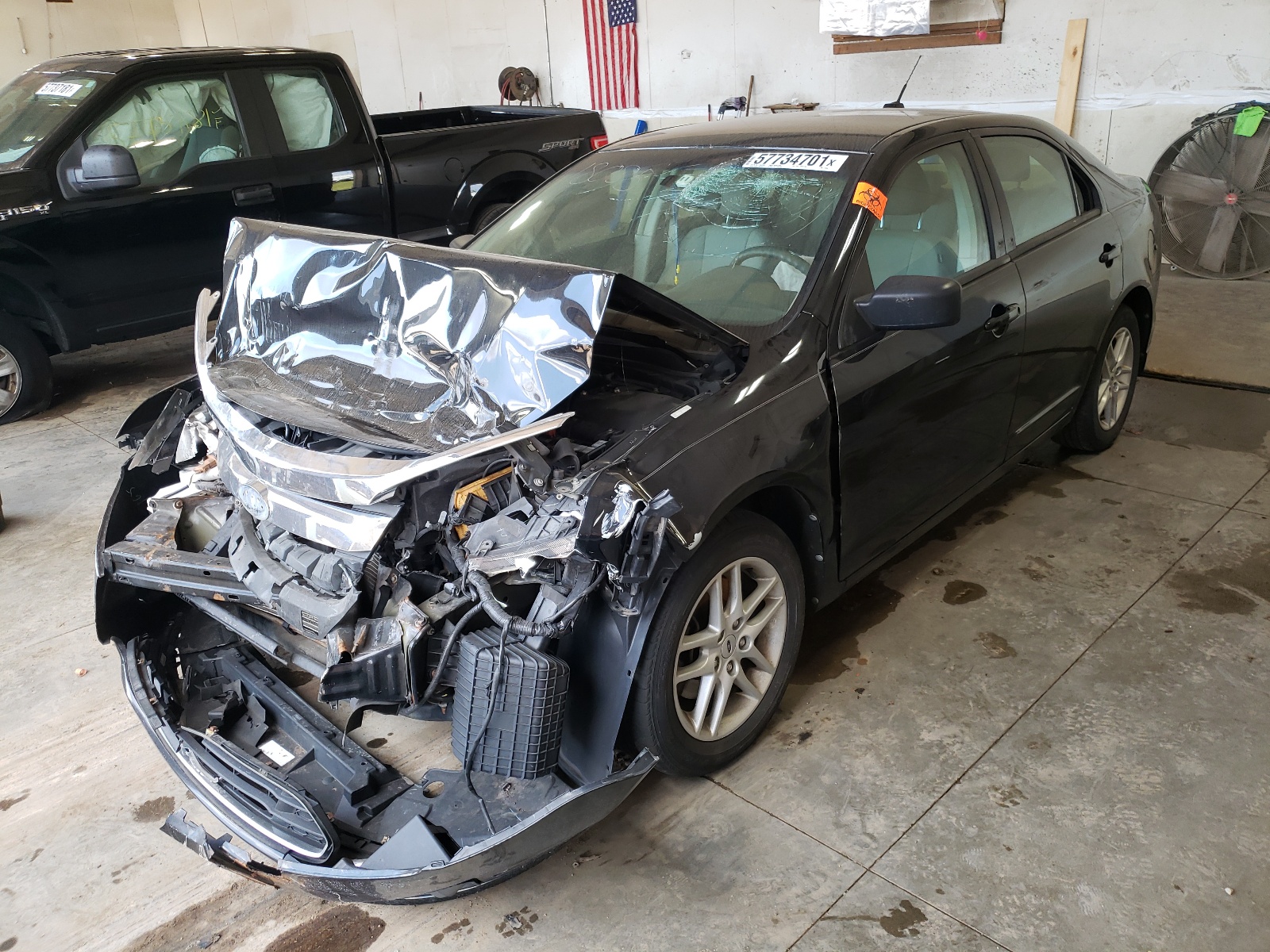 Photo 2 from auction – 2012 FORD FUSION S with VIN 3FAHP0GA9CR118085