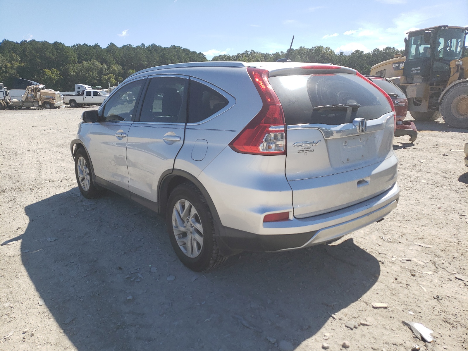 Photo 3 from auction – 2016 HONDA CR-V EXL with VIN 2HKRM3H77GH500216