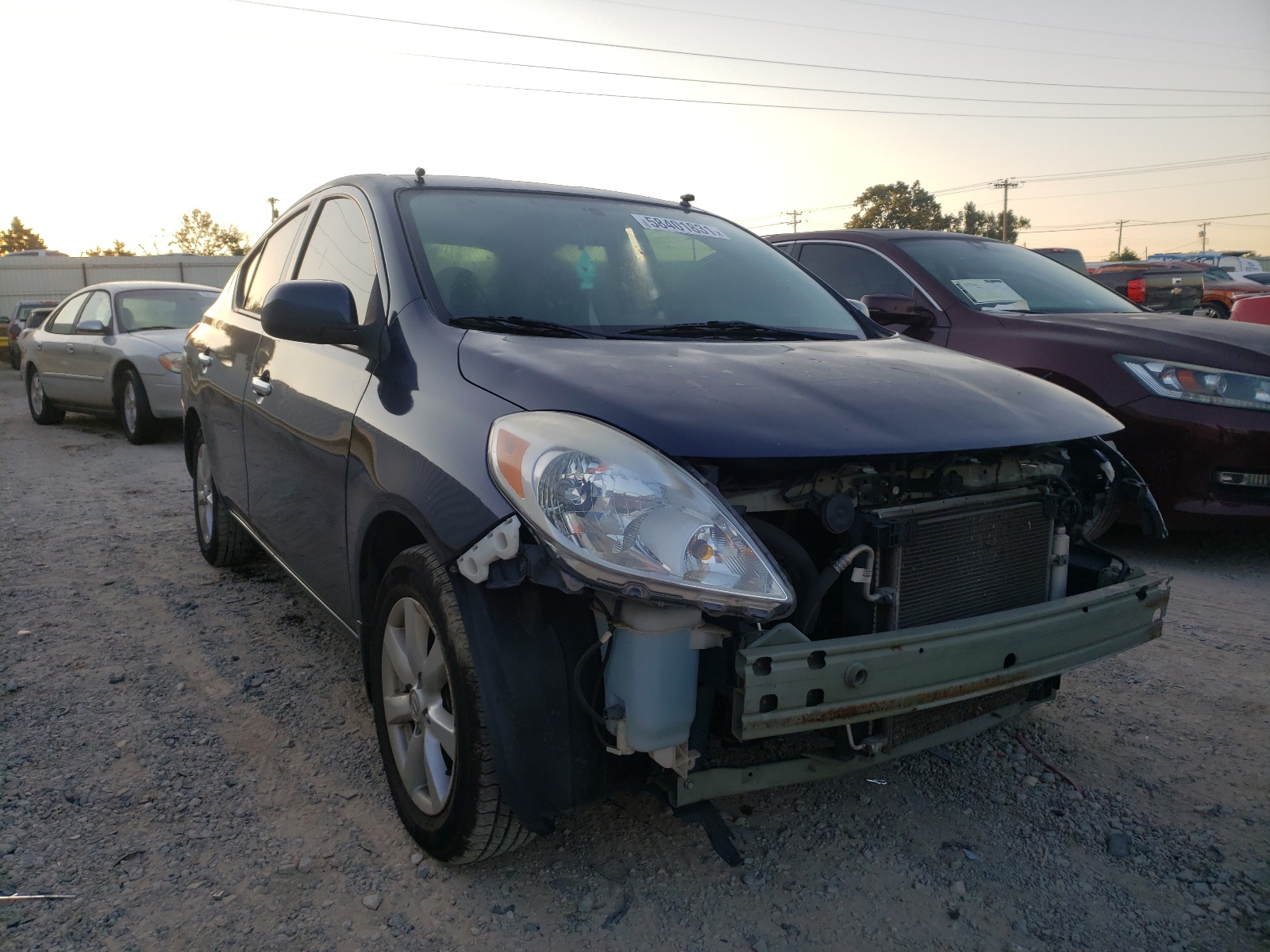 NISSAN VERSA S 2014 with VIN 3N1CN7AP9EL844344 - Photo from auction