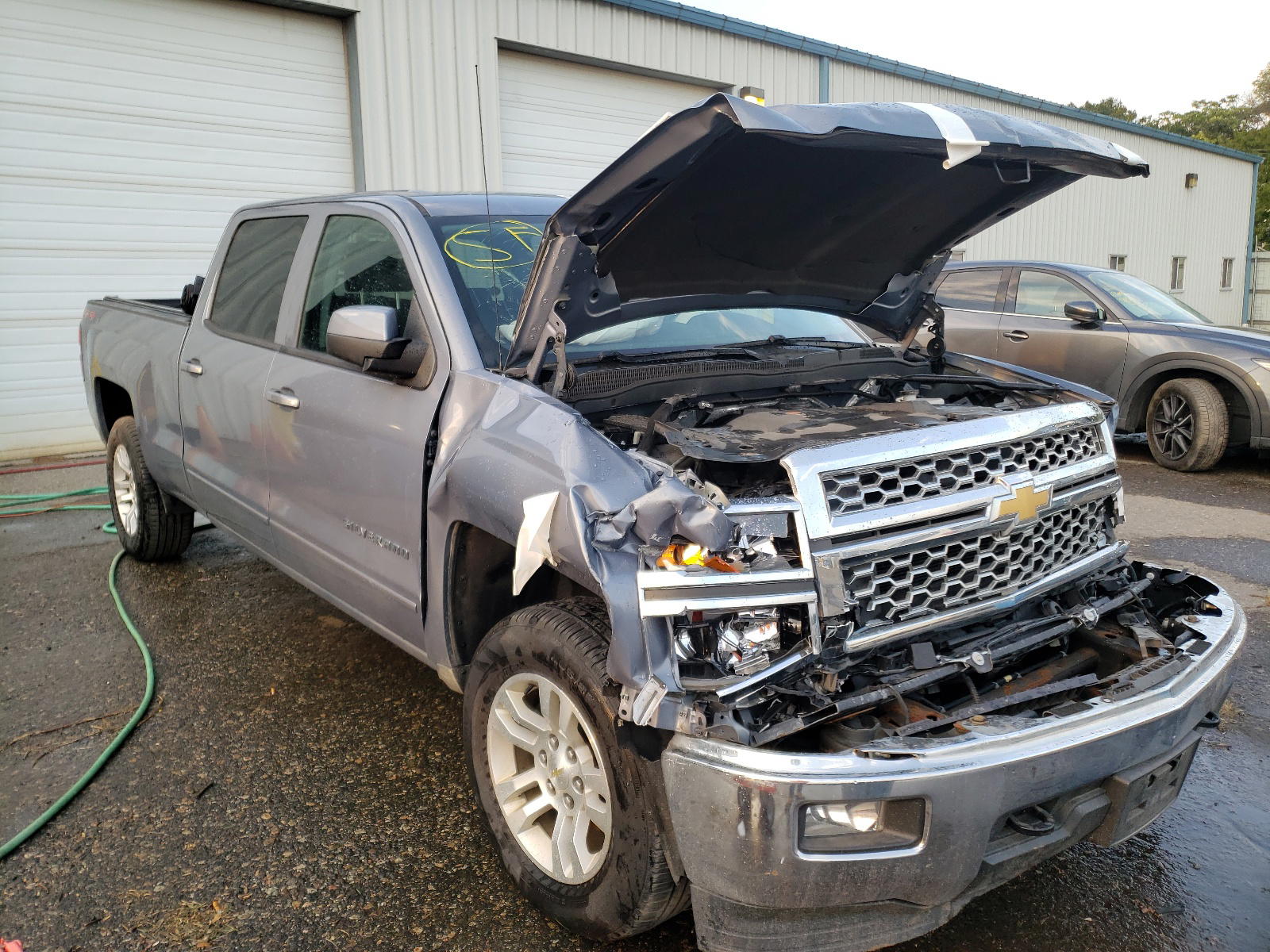 CHEVROLET SILVERADO 2015 with VIN 1GCUKREC8FF200875 - Photo from auction