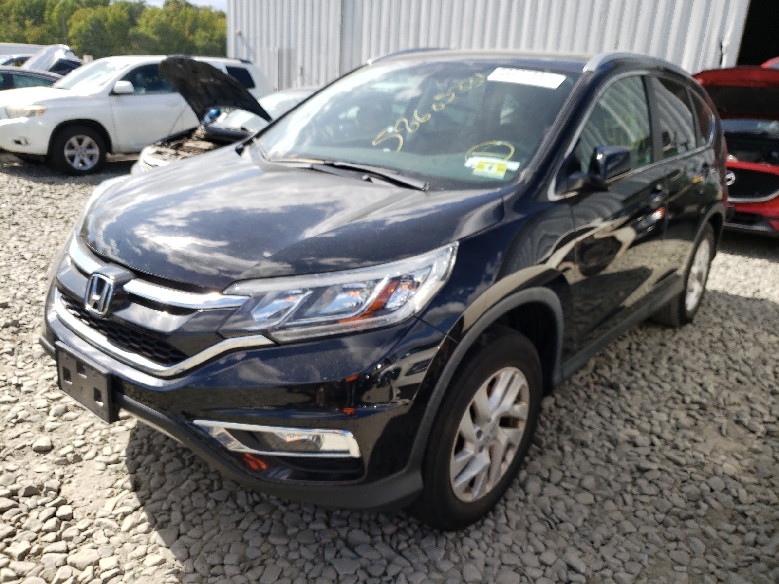 Photo 2 from auction – 2016 HONDA CR-V EXL with VIN 2HKRM4H71GH684414