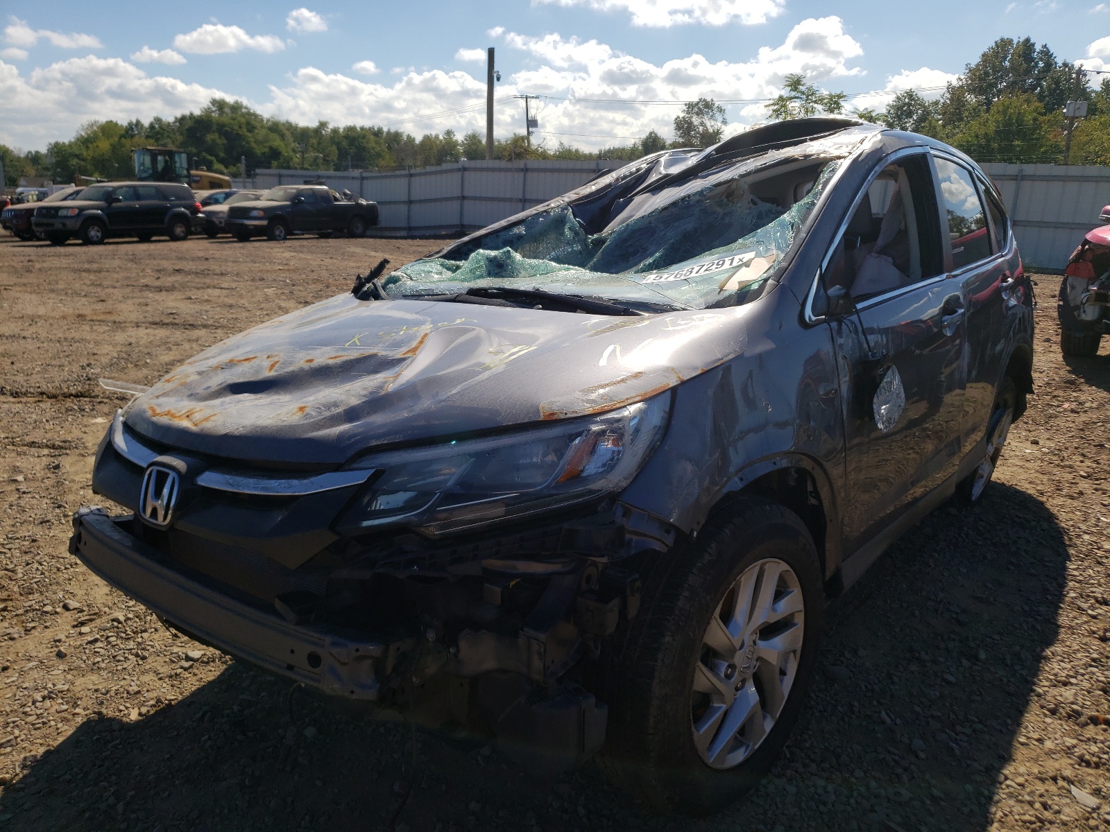 Photo 2 from auction – 2016 HONDA CR-V EX with VIN 2HKRM4H58GH728004