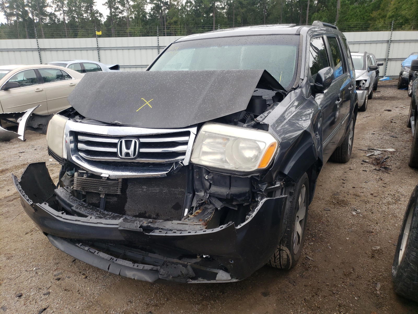 Photo 2 from auction – 2013 HONDA PILOT TOUR with VIN 5FNYF4H99DB076593