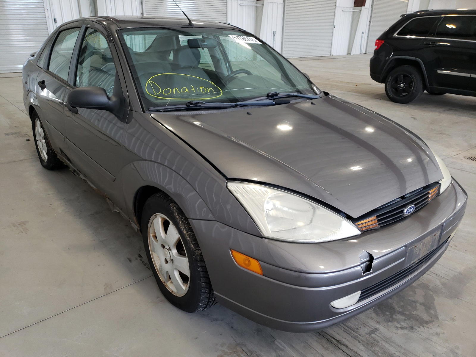 FORD FOCUS 2002 with VIN 1FAFP38312W199054 - Photo from auction