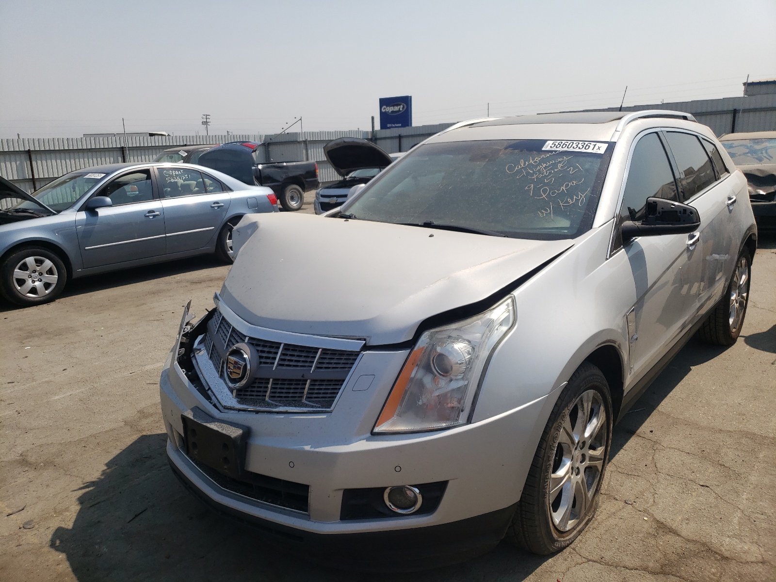Photo 2 from auction – 2010 CADILLAC SRX PERFOR with VIN 3GYFNBEY6AS648548