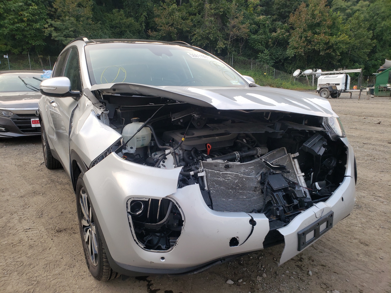 KIA SPORTAGE E 2018 with VIN KNDPNCACXJ7384744 - Photo from auction