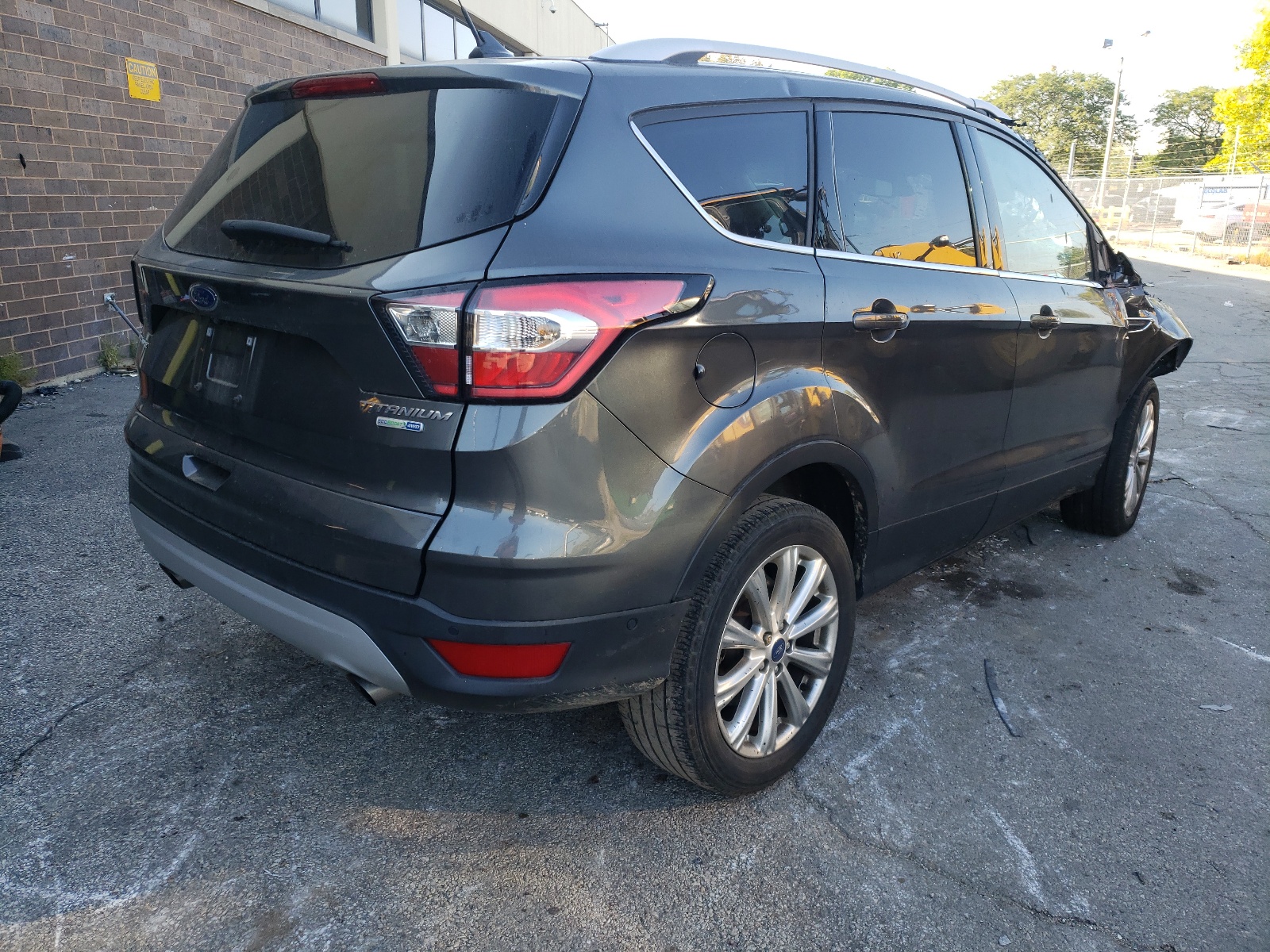 Photo 4 from auction – 2018 FORD ESCAPE TIT with VIN 1FMCU9J94JUB68636