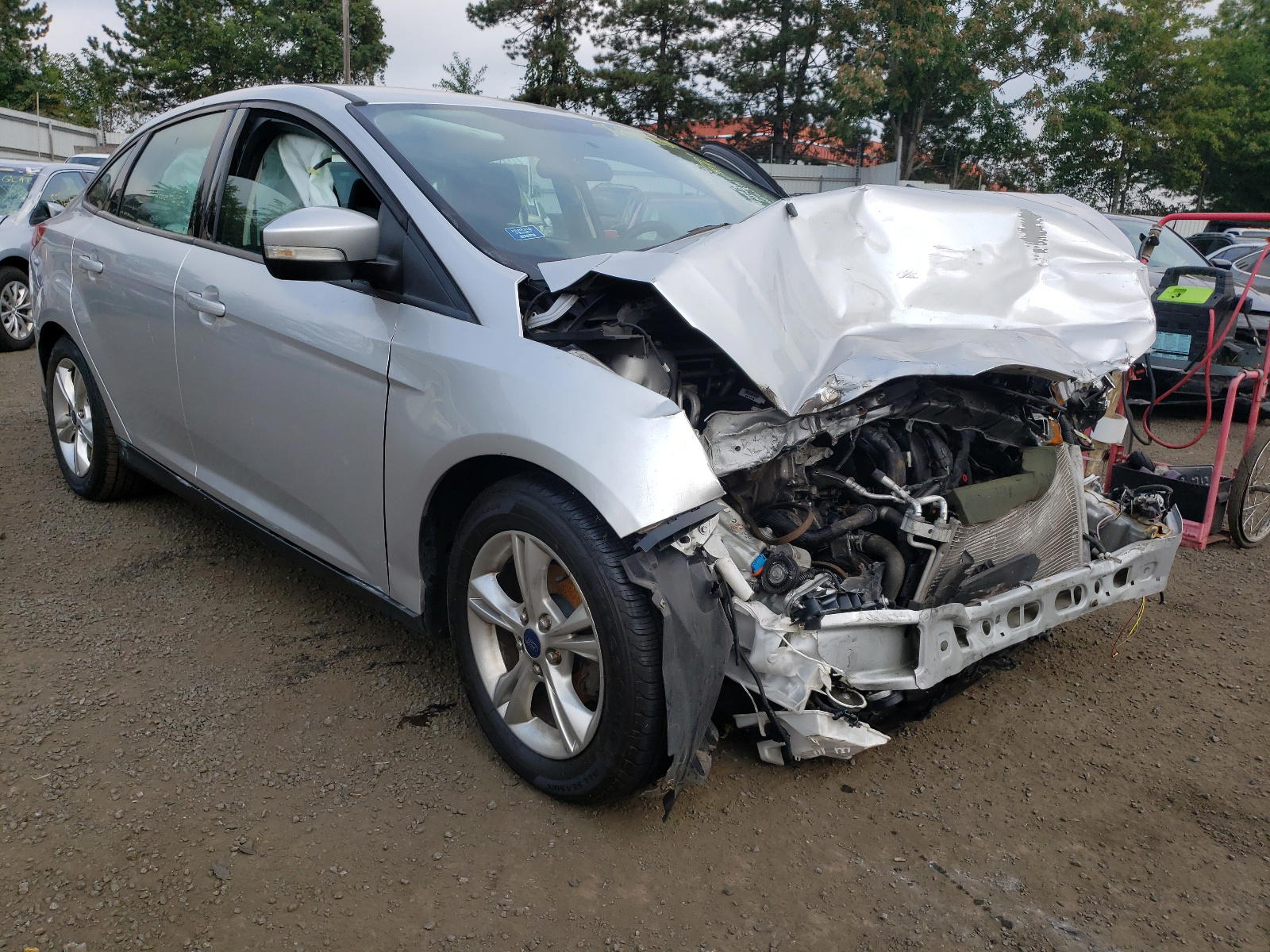 FORD FOCUS SE 2014 with VIN 1FADP3F23EL371415 - Photo from auction