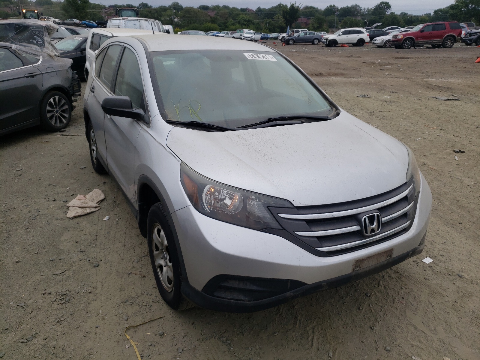 HONDA CR-V LX 2014 with VIN 2HKRM3H39EH521532 - Photo from auction