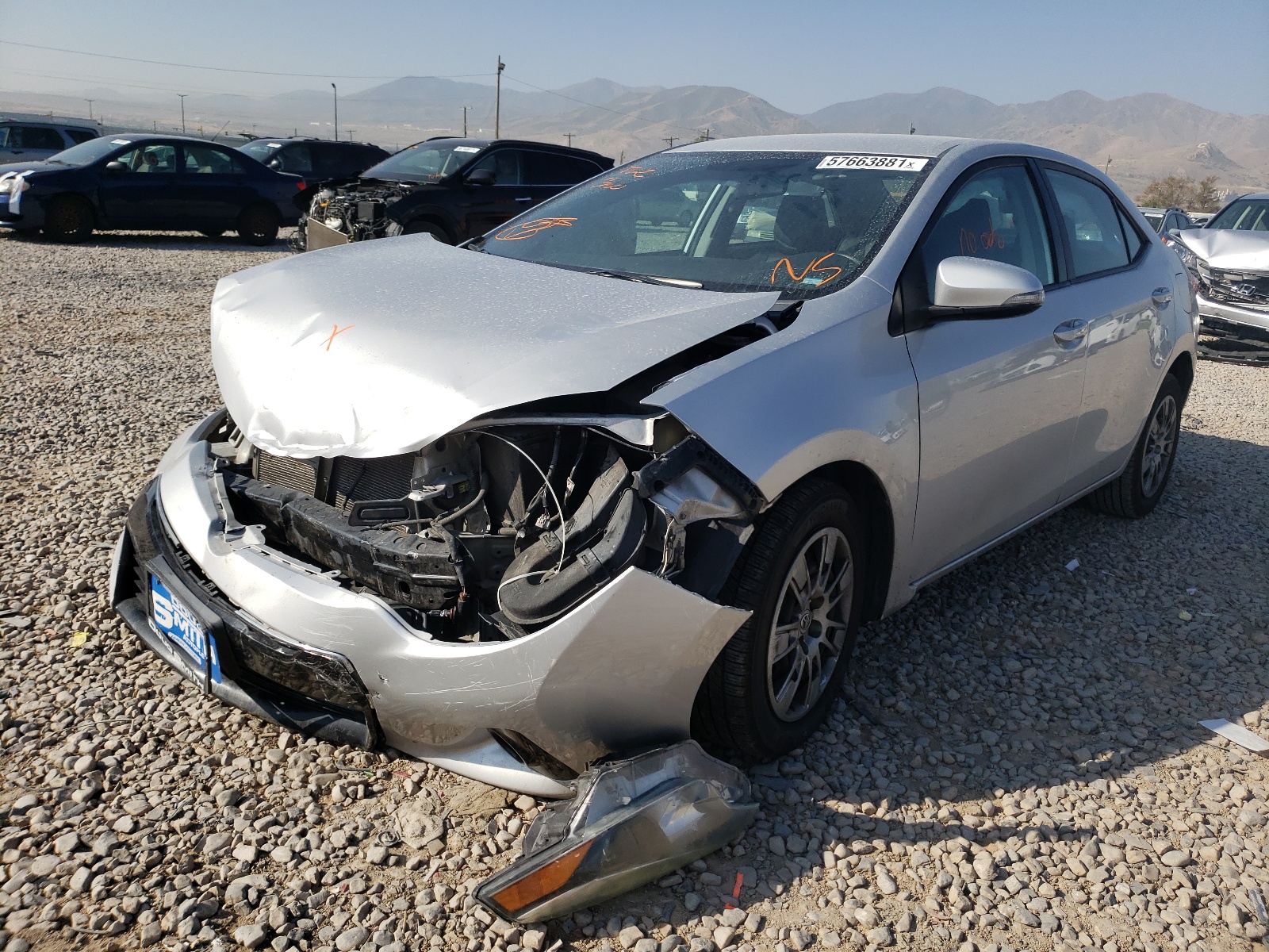 Photo 2 from auction – 2014 TOYOTA COROLLA L with VIN 5YFBURHE9EP111290