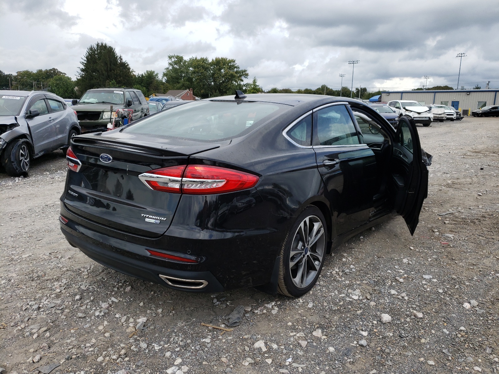 Photo 4 from auction – 2020 FORD FUSION TIT with VIN 3FA6P0D99LR193385