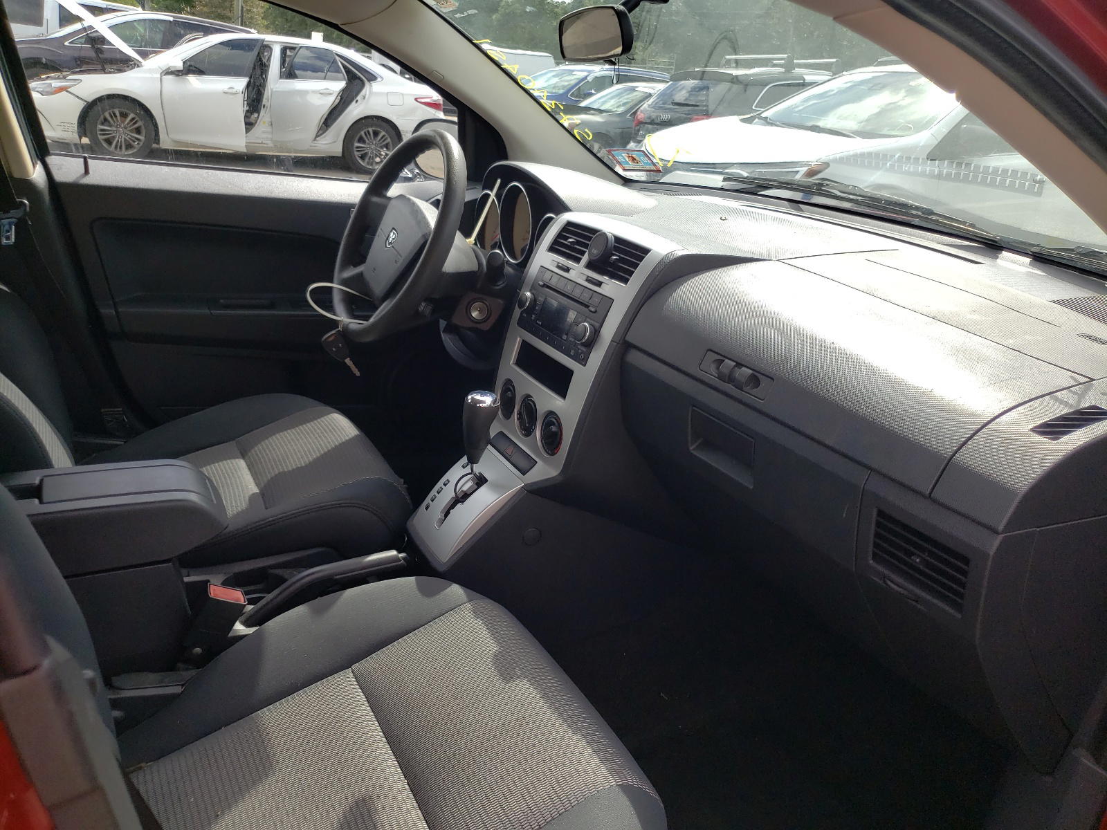 Photo 5 from auction – 2009 DODGE CALIBER SX with VIN 1B3HB48A49D200405