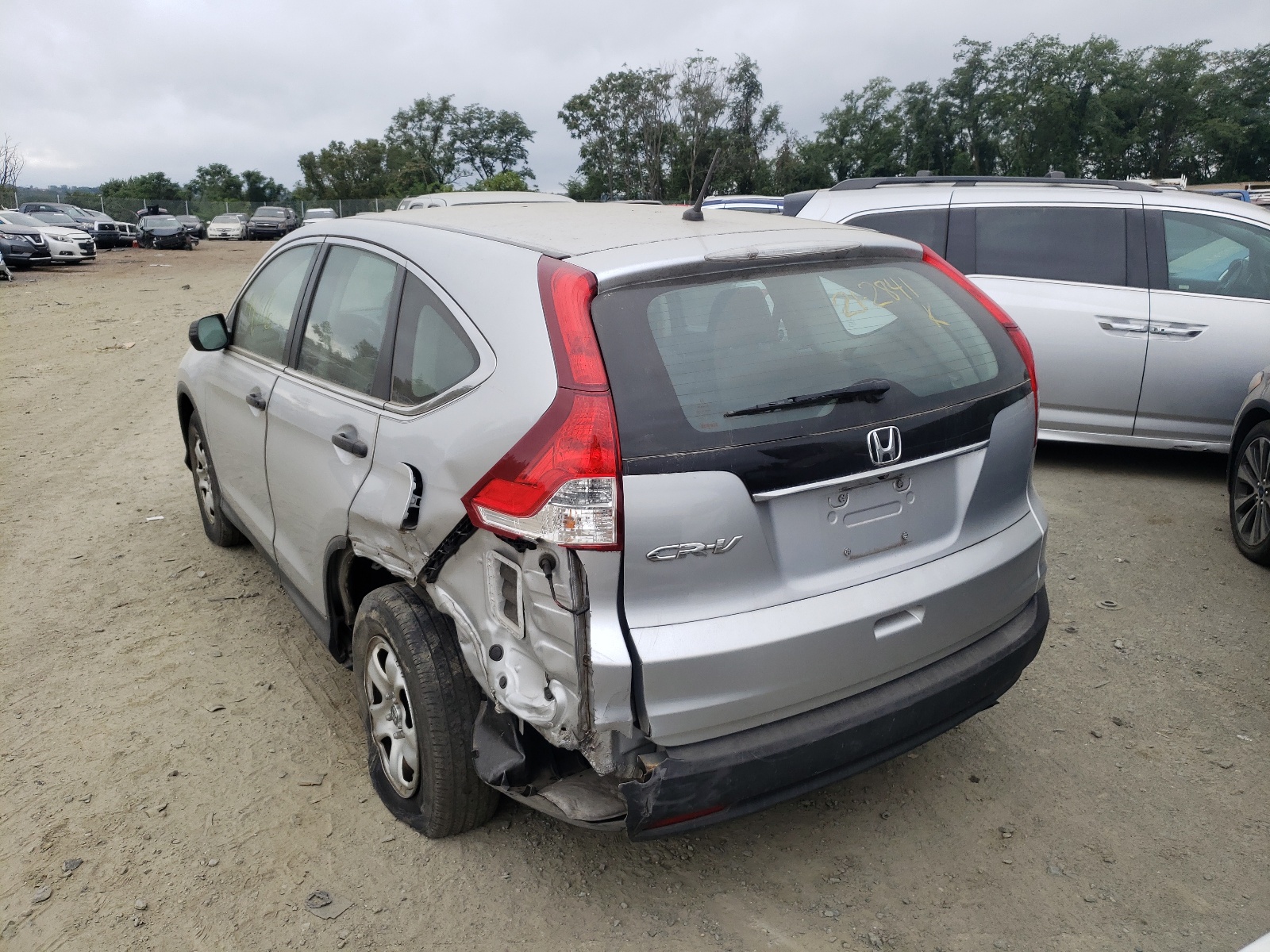 Photo 3 from auction – 2014 HONDA CR-V LX with VIN 2HKRM3H39EH521532