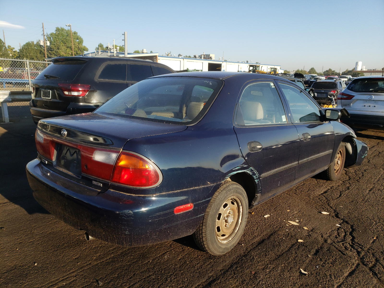 Photo 4 from auction – 1997 MAZDA PROTEGE DX with VIN JM1BC1419V0133775