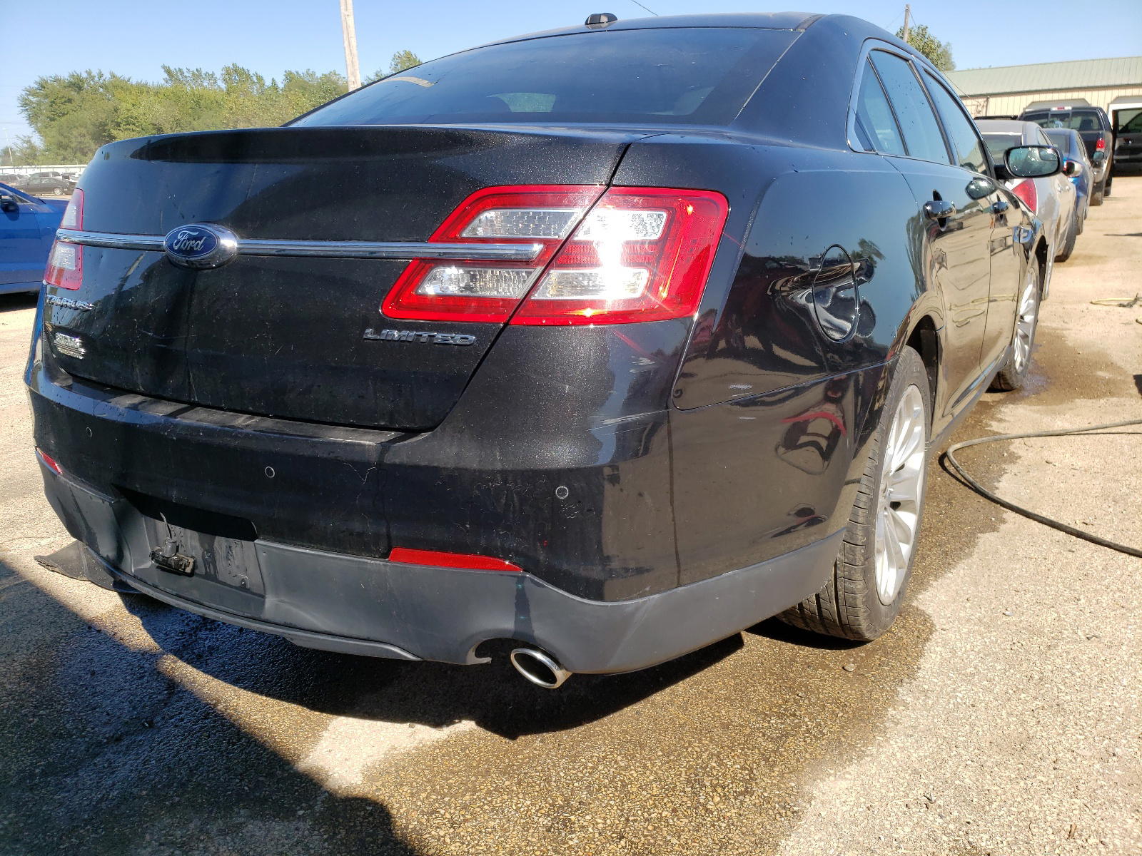 Photo 4 from auction – 2013 FORD TAURUS LIM with VIN 1FAHP2F85DG129457