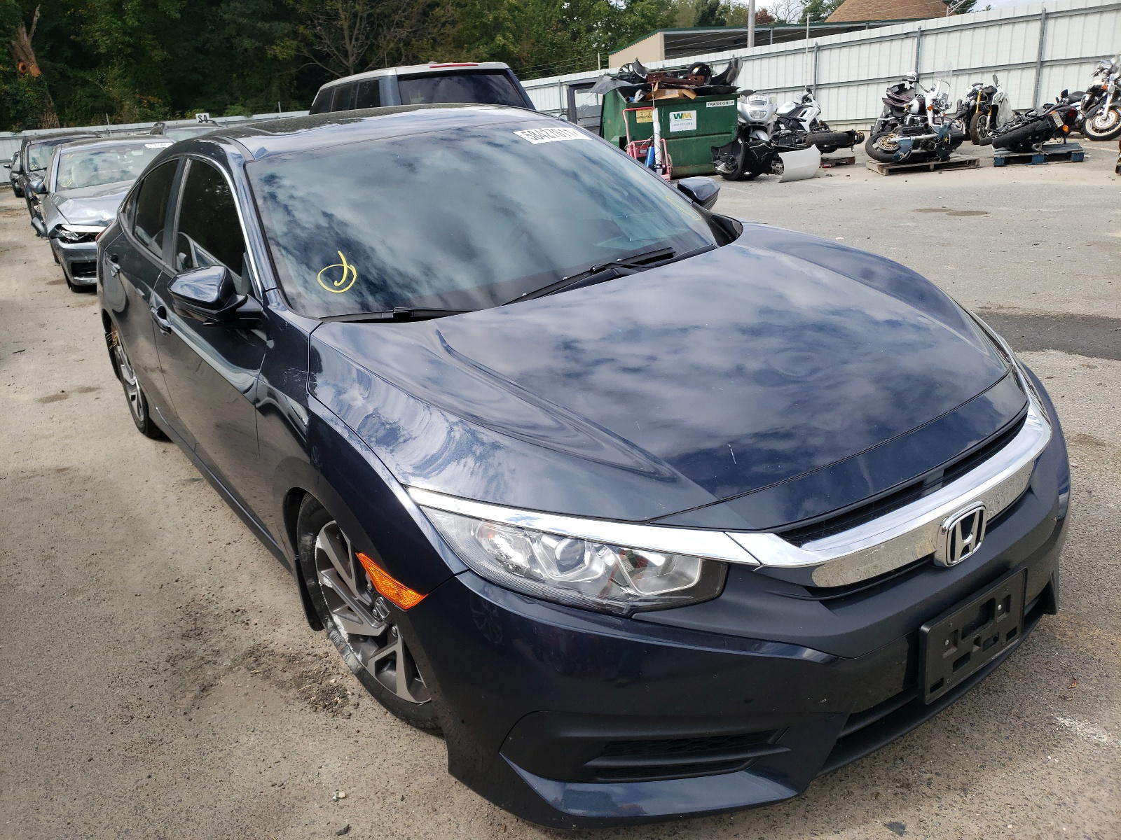 HONDA CIVIC EX 2018 with VIN 2HGFC2F76JH509980 - Photo from auction