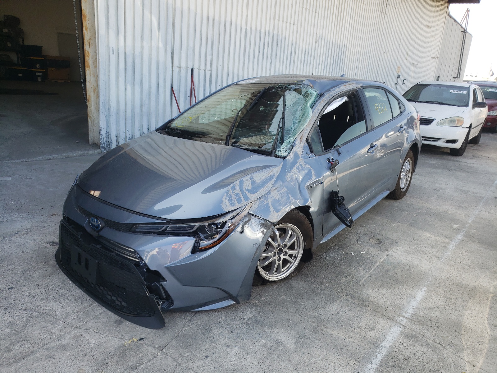 Photo 2 from auction – 2021 TOYOTA COROLLA LE with VIN JTDEAMDE7MJ027759