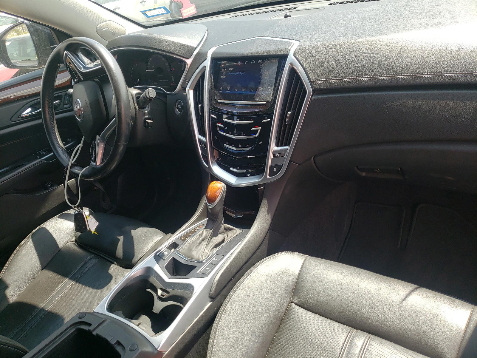 Photo 9 from auction – 2015 CADILLAC SRX with VIN 3GYFNBE36FS510147