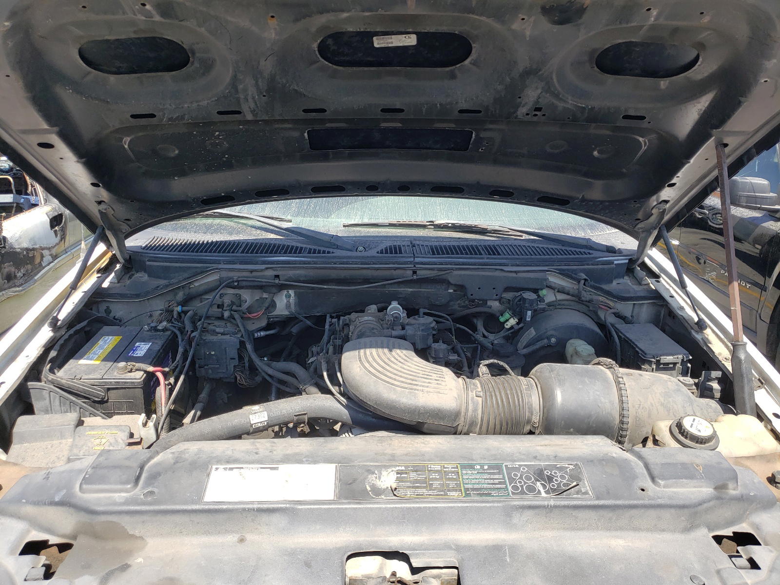 Photo 7 from auction – 2002 FORD F150 with VIN 1FTRX17W72KC52435