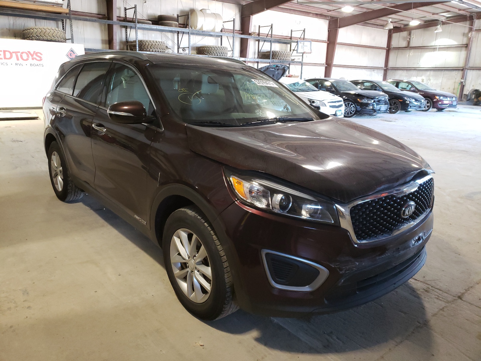 KIA SORENTO LX 2016 with VIN 5XYPGDA55GG034807 - Photo from auction