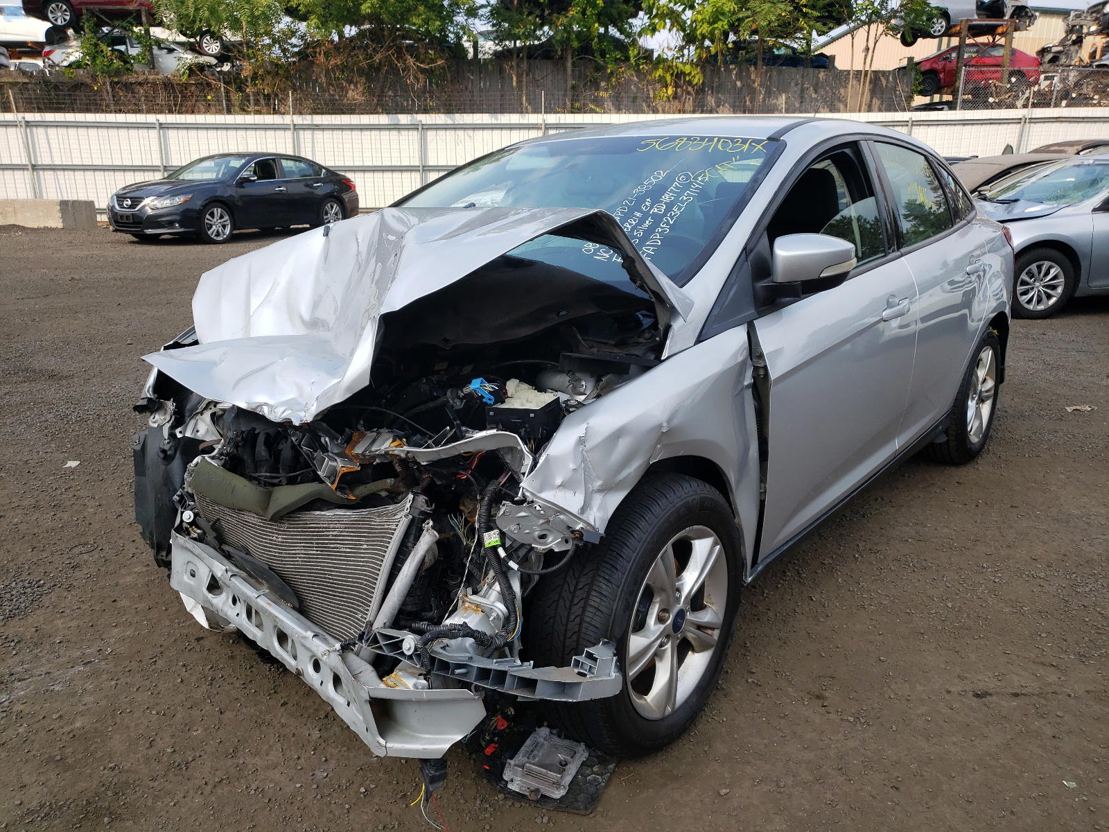 Photo 2 from auction – 2014 FORD FOCUS SE with VIN 1FADP3F23EL371415