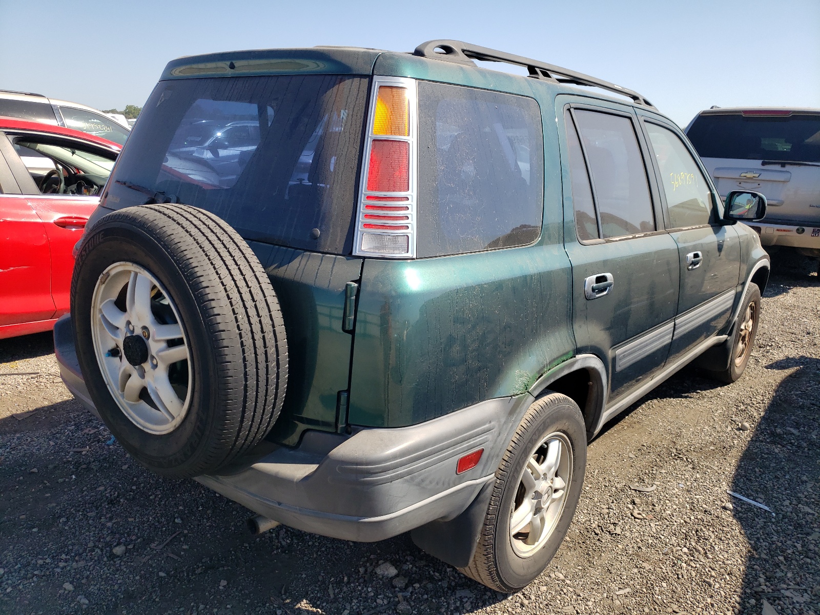 Photo 4 from auction – 1999 HONDA CR-V with VIN JHLRD1868XC084915