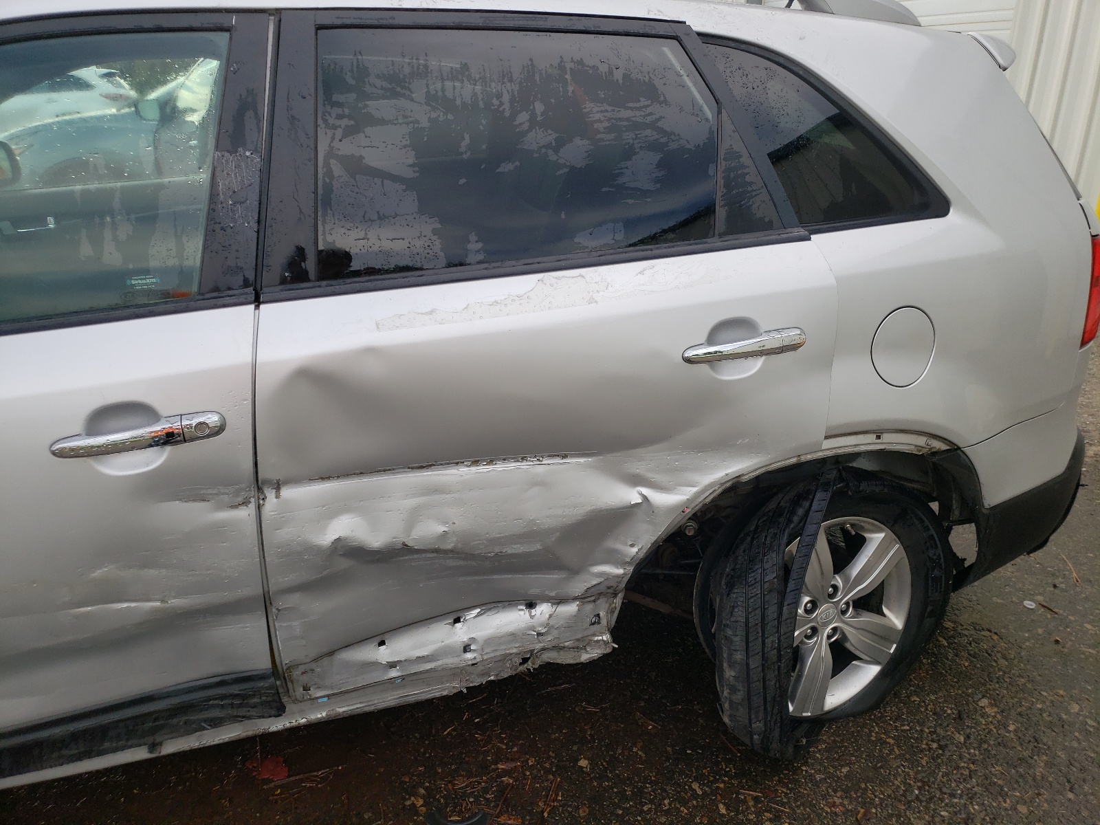 Photo 9 from auction – 2013 KIA SORENTO EX with VIN 5XYKUDA28DG396876