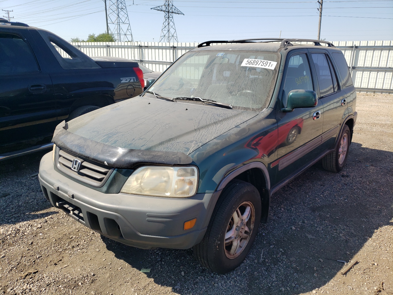 Photo 2 from auction – 1999 HONDA CR-V with VIN JHLRD1868XC084915