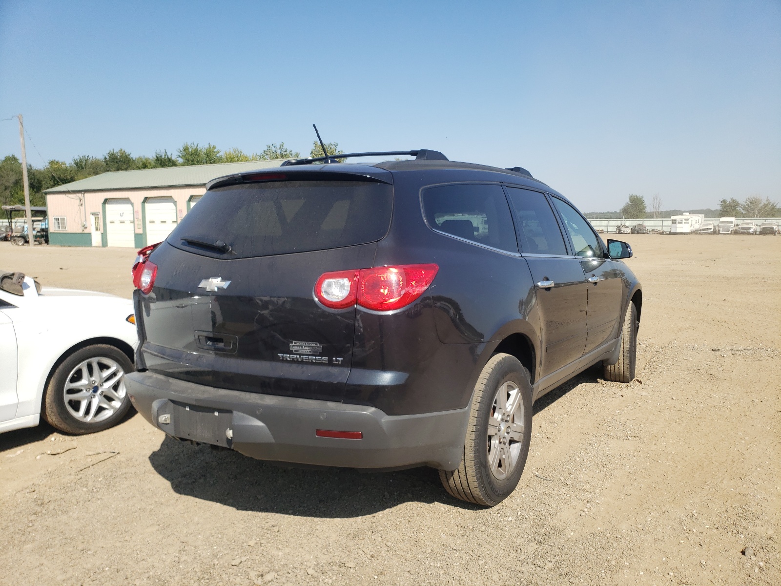 Photo 4 from auction – 2010 CHEVROLET TRAVERSE L with VIN 1GNLRFEDXAJ233324