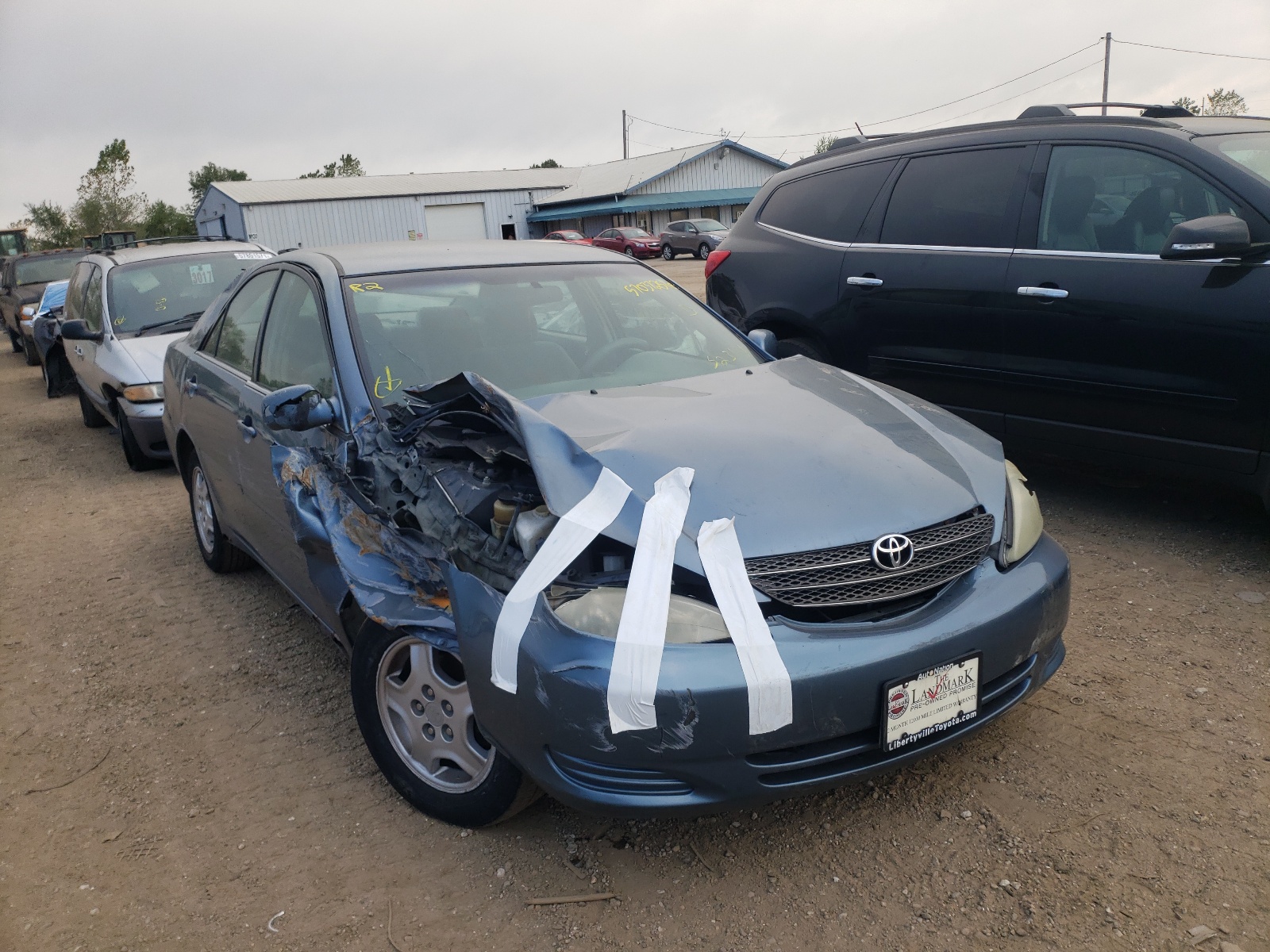 TOYOTA CAMRY LE 2002 with VIN 4T1BF30K62U523136 - Photo from auction