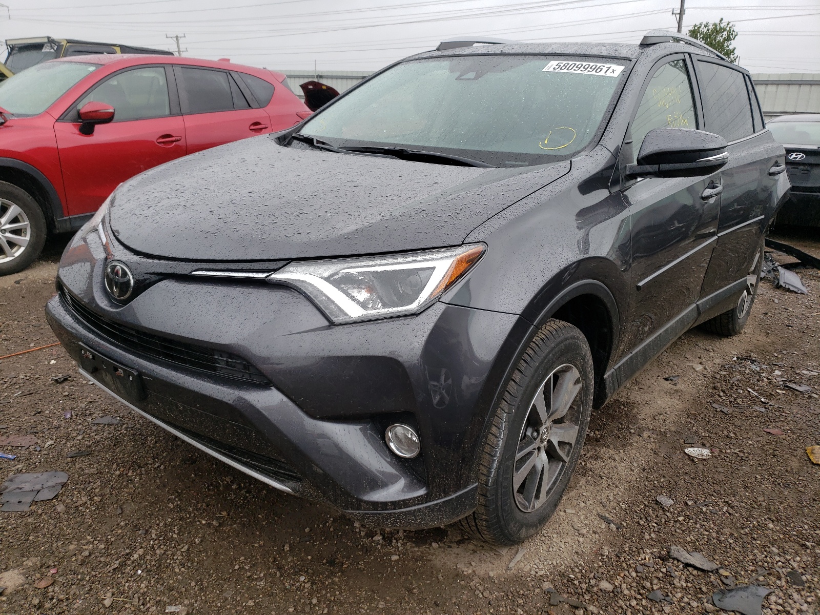 Photo 2 from auction – 2018 TOYOTA RAV4 ADVEN with VIN JTMRFREV0JJ176301