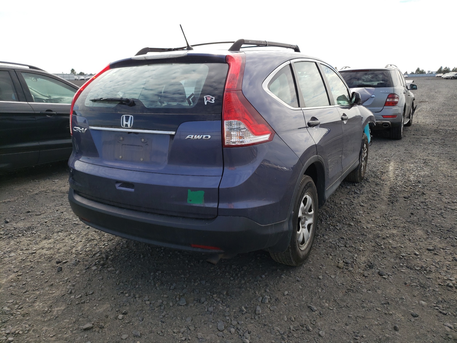 Photo 4 from auction – 2013 HONDA CR-V LX with VIN 2HKRM4H35DH666328