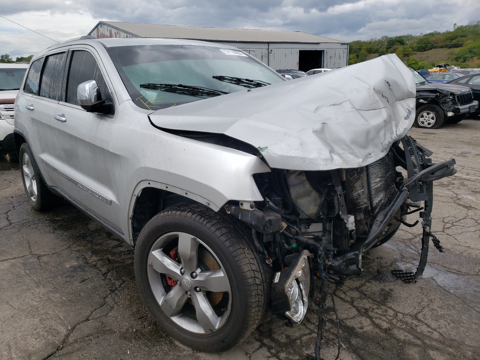 JEEP GRAND CHER 2011 with VIN 1J4RR6GT0BC713119 - Photo from auction