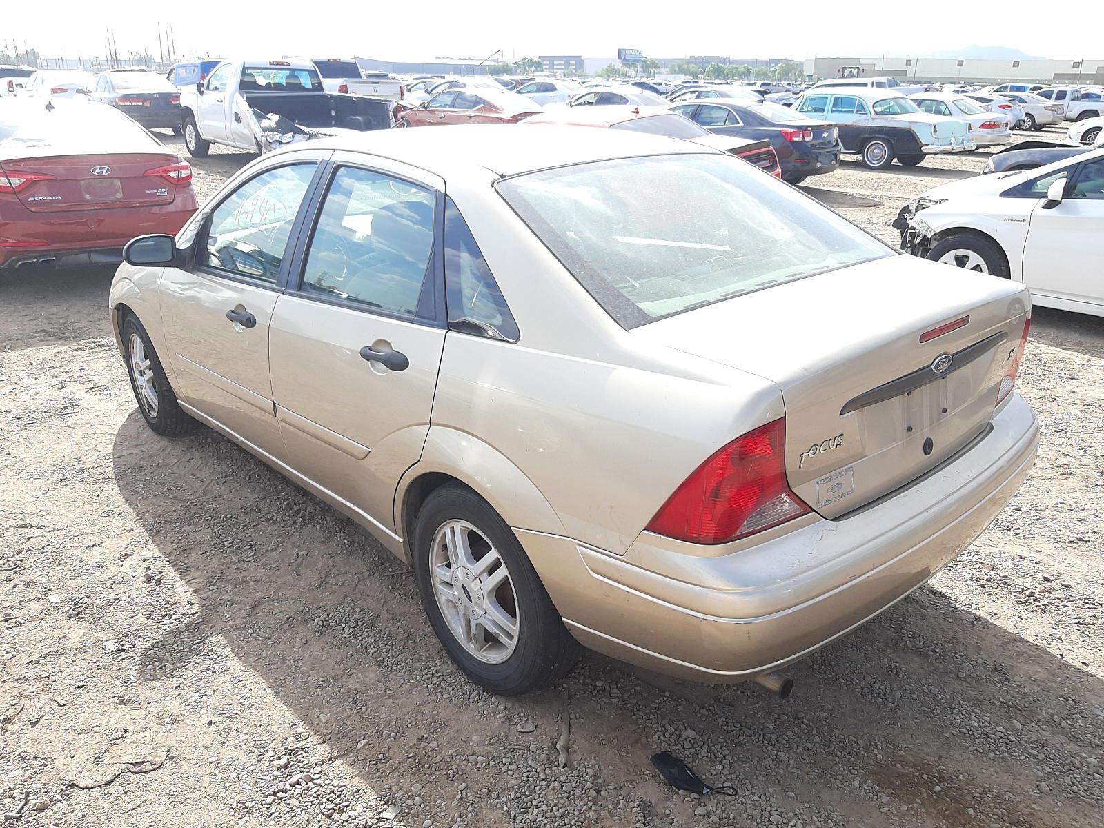 Photo 3 from auction – 2000 FORD FOCUS SE with VIN 1FAFP3431YW401275