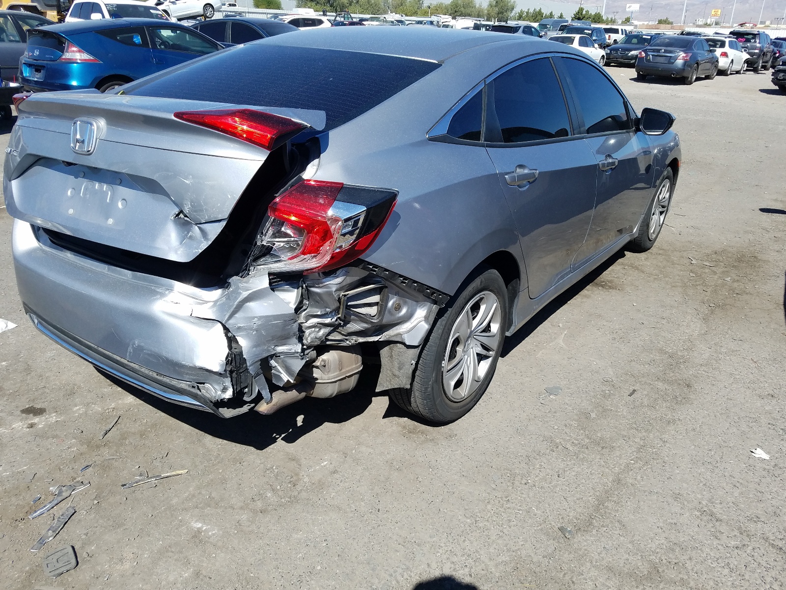 Photo 4 from auction – 2019 HONDA CIVIC LX with VIN 19XFC2F69KE202046