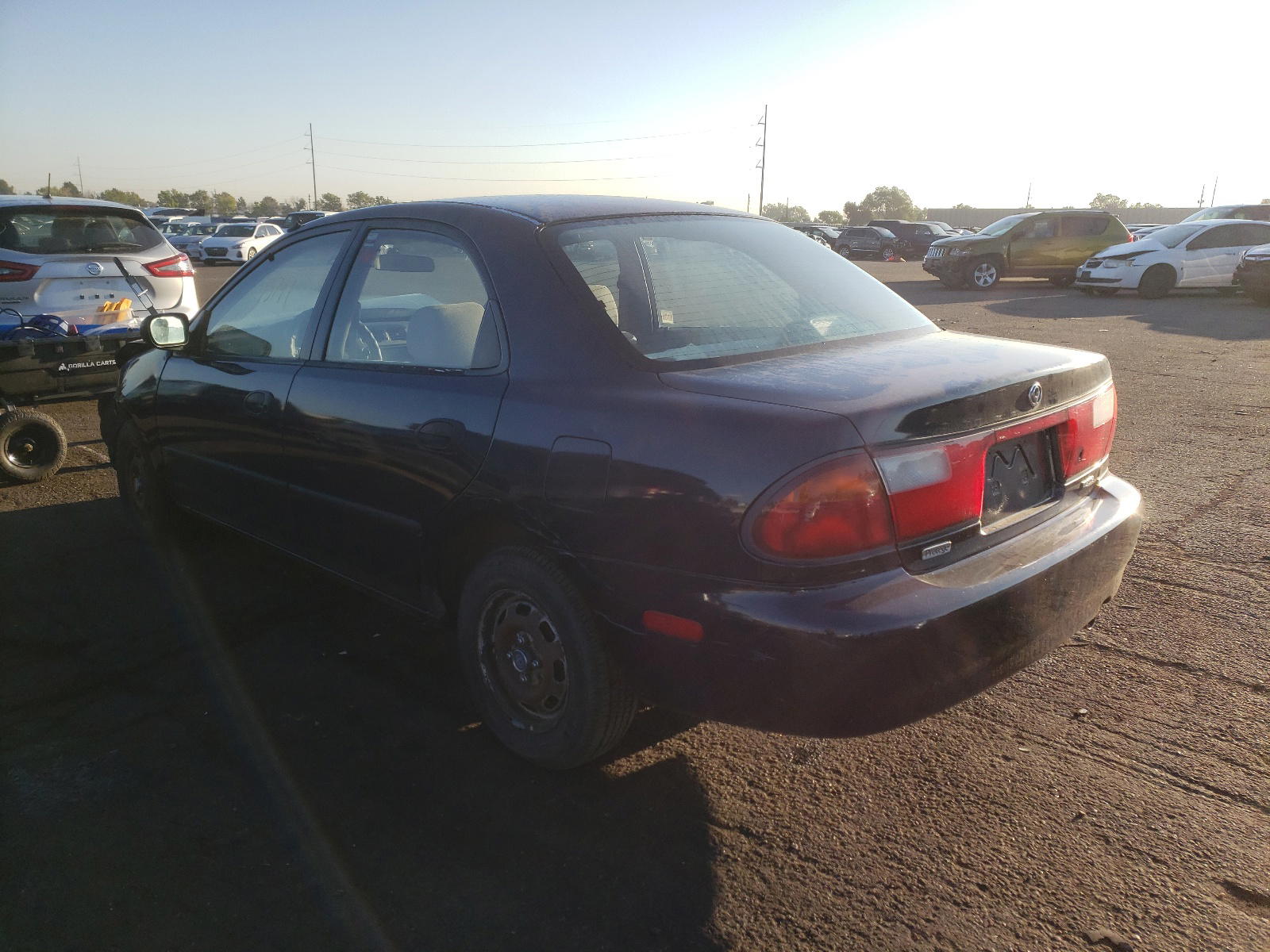Photo 3 from auction – 1997 MAZDA PROTEGE DX with VIN JM1BC1419V0133775