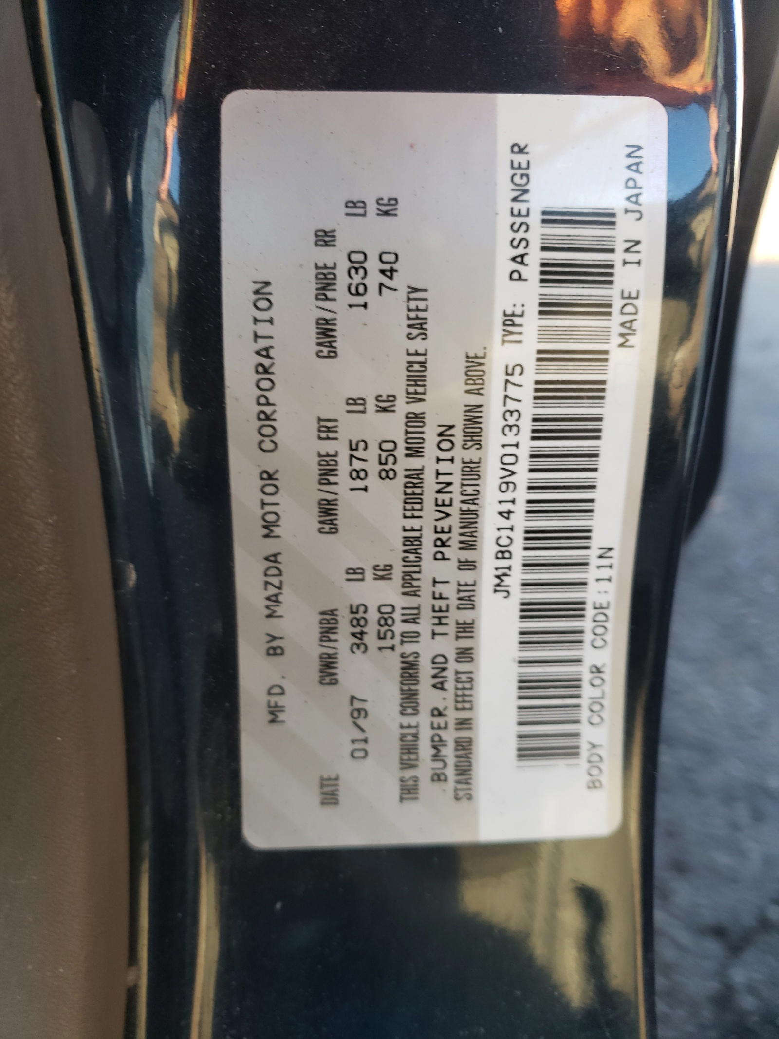 Photo 10 from auction – 1997 MAZDA PROTEGE DX with VIN JM1BC1419V0133775