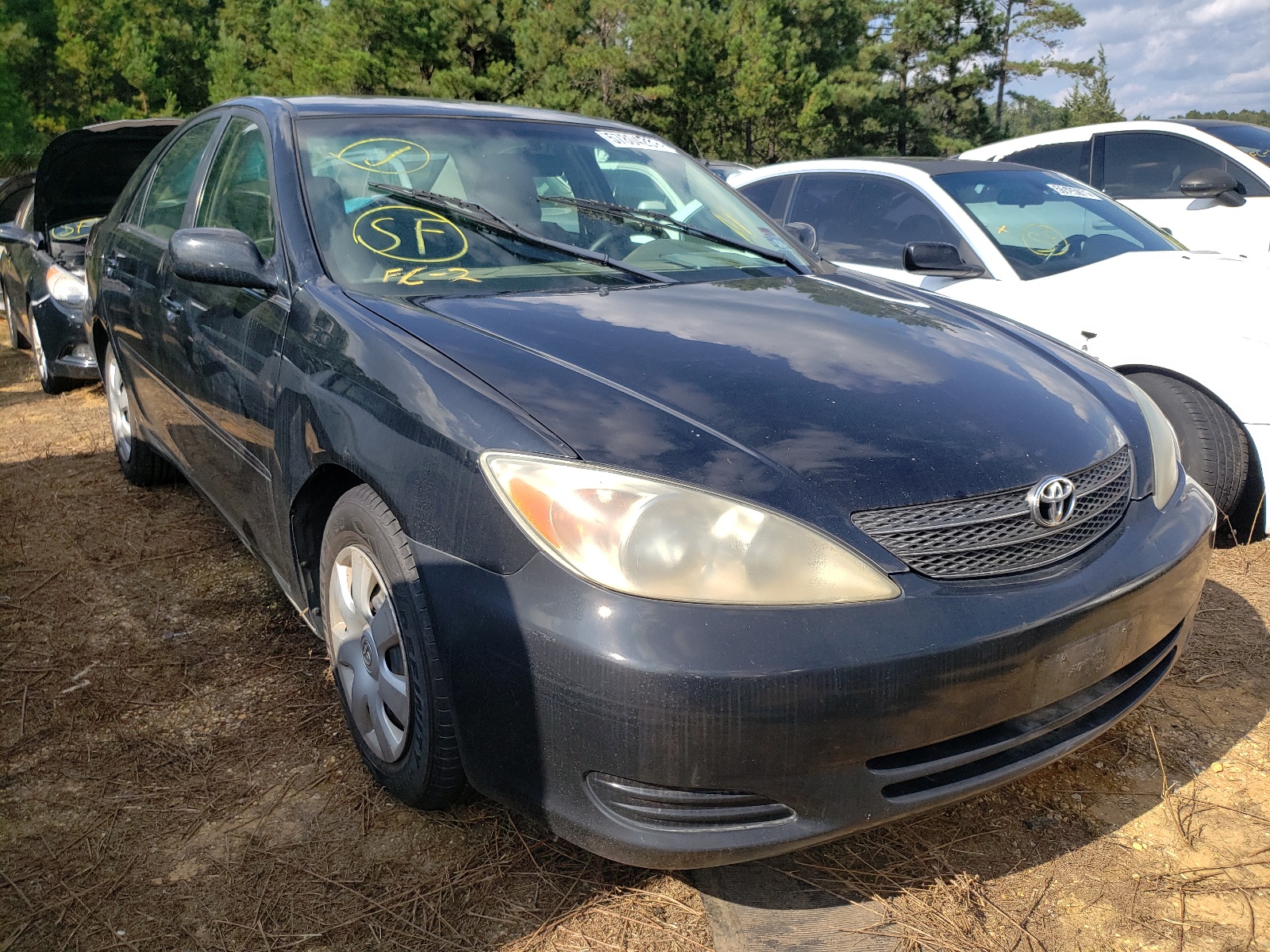 TOYOTA CAMRY 2003 with VIN 4T1BE32KX3U167842 - Photo from auction